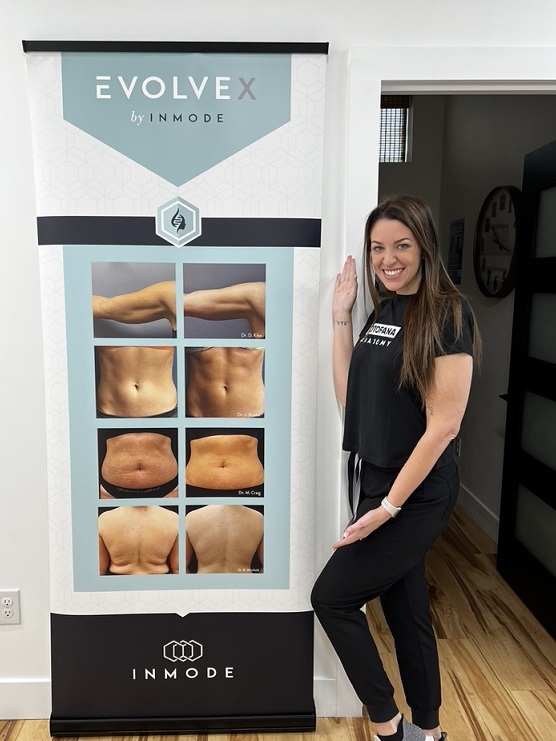 woman next to a banner